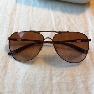 Rose gold Oakley sunglasses